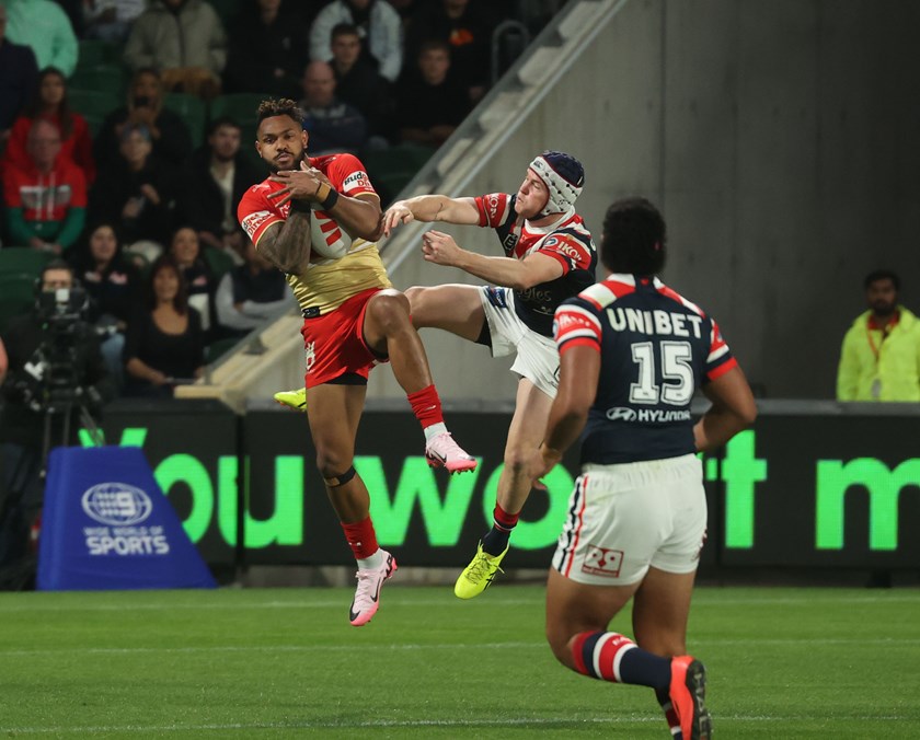Hamiso Tabuai-Fidow comes down with a kick against the Roosters when the Dolphins met the Roosters in Perth last year.