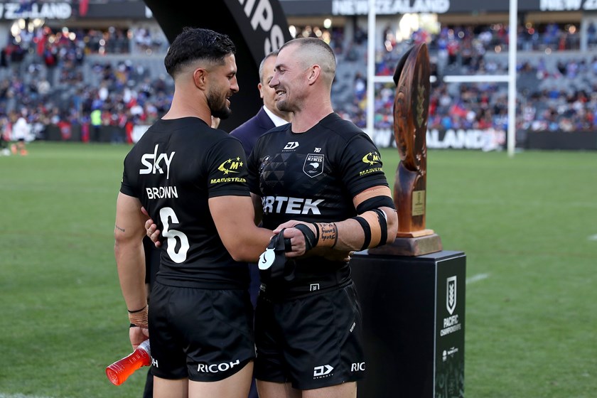 Dylan Brown and Kieran Foran embrace.