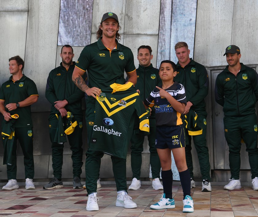 Nicho Hynes is presented with his debut jersey at Federation Square in Melbourne.