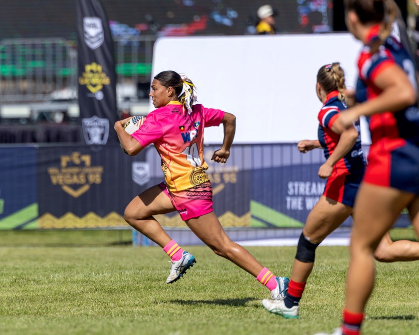 Tanika Marshall strides out.