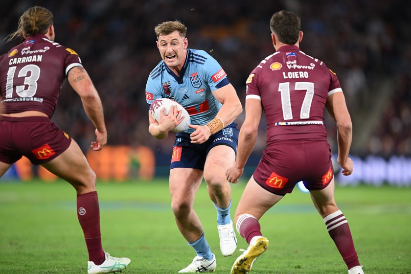 Max King runs into the Queensland defence.