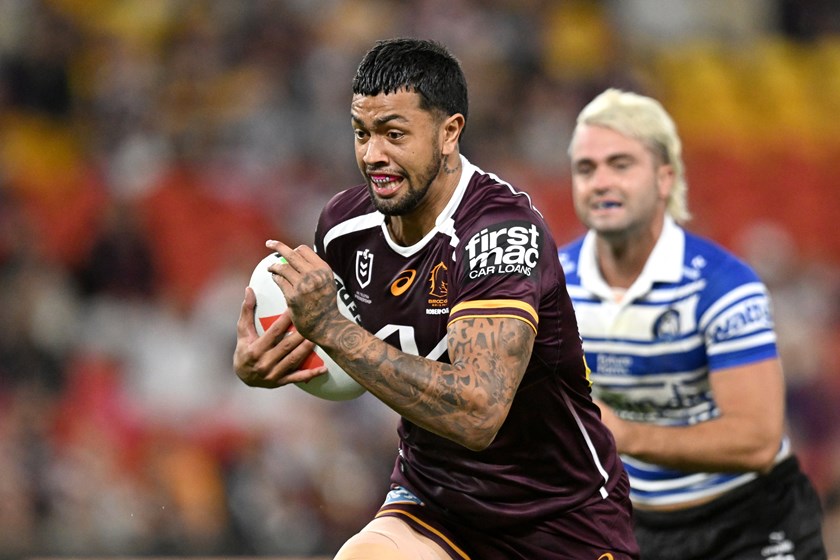 Xavier Willison carries the ball for the Broncos.