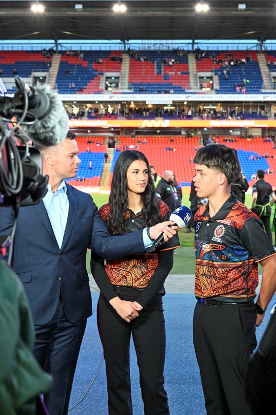 Ambassadors Meerah Sehgal and Kane Munt interviewed by Jake Duke at McDonald Jones Stadium during Indigenous Round.