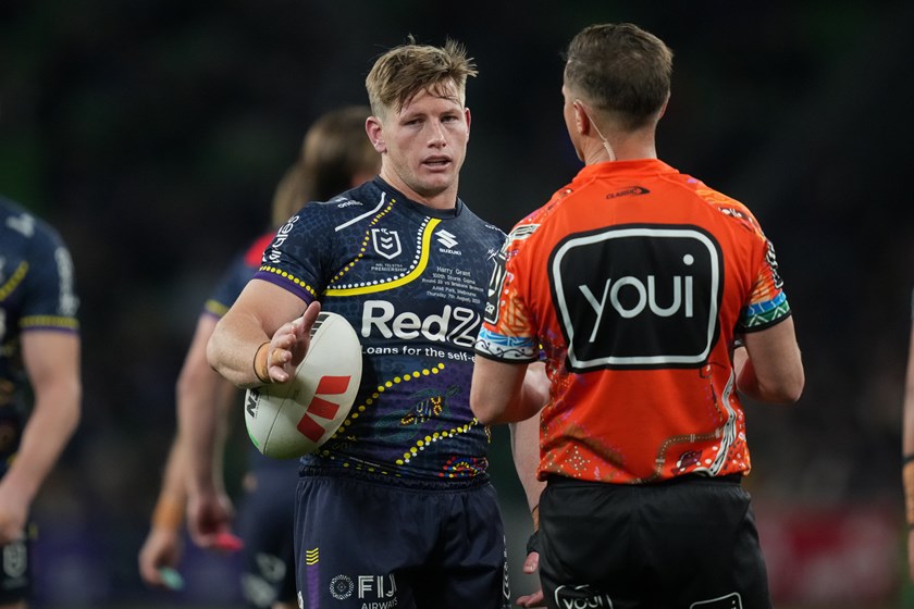 Referee Grant Atkins wears his Indigenous Round jersey during the game between Storm and Brisbane.