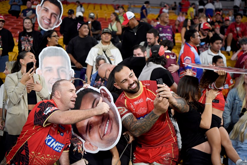 Josh Kerr celebrates with supporters.