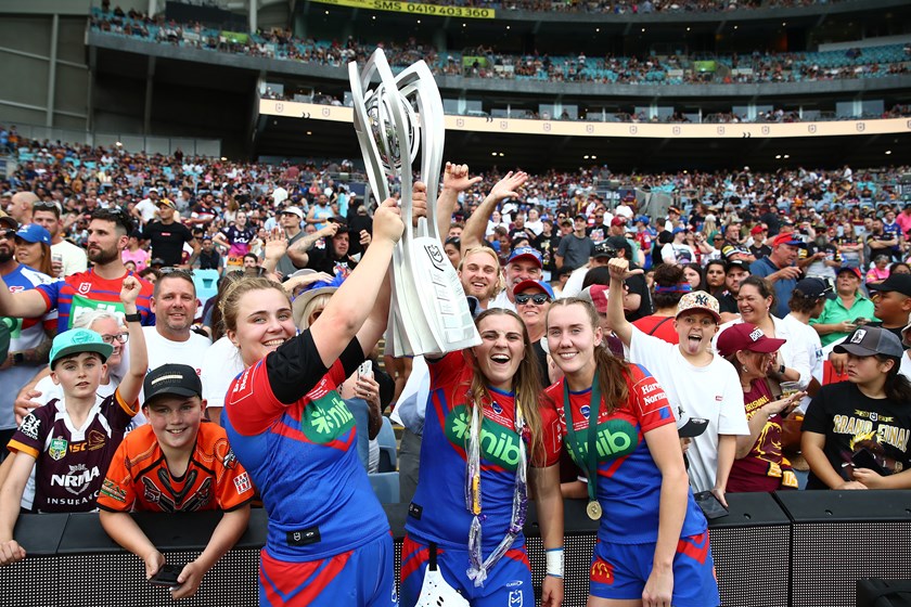 Hannah Southwell with the NRLW premiership trophy and team-mates Jesse Southwell and Tamika Upton.