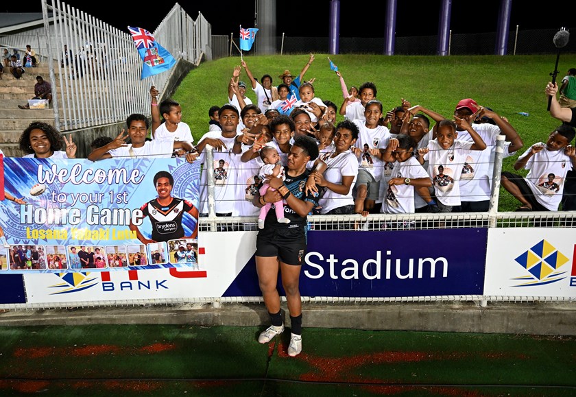 Losana Lutu's Fijian family showed their support for the star playmaker with a banner and t-shirts 