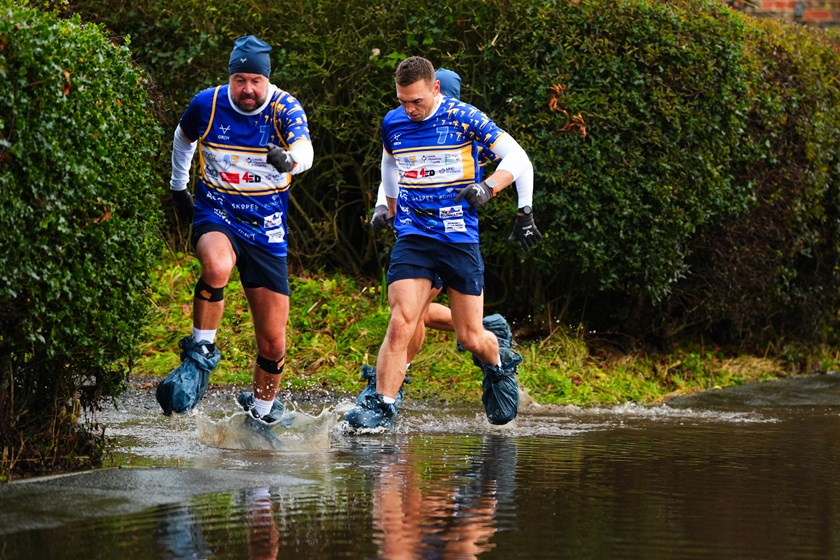A flooded road wasn't going to stop Kevin Sinfield and his team from completing the 7 in 7 Together Challenge to raise funds for Motor Neurone Disease.