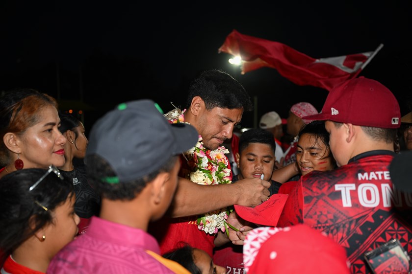 Pacific pioneer Jason Taumalolo signs autographs at the Tongan fan day in Brisbane.