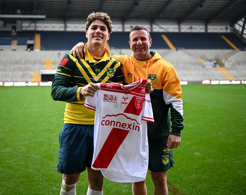 Wilie Peters presents Kangaroos star Reece Walsh with a Hull KR jersey during their Ashes Series campaign together in England.